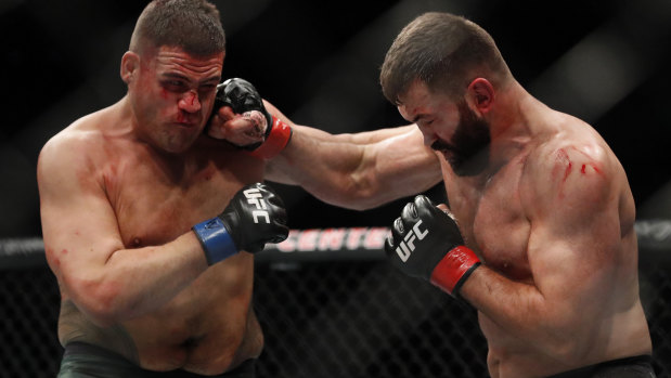 Bloodied and bruised: Tai Tuivasa took some heat during his win over Andrei Arlovski.