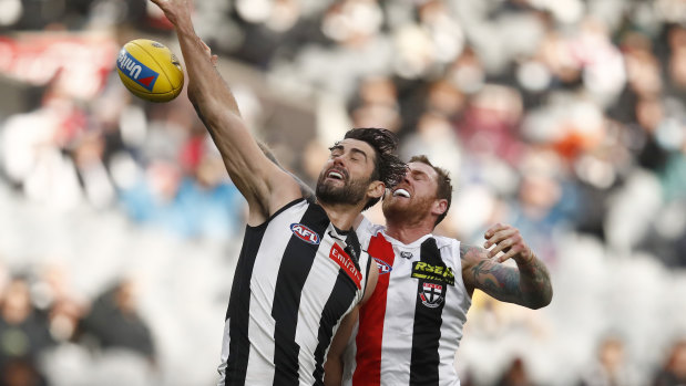 Brodie Grundy of the Magpies and Tim Membrey of the Saints.