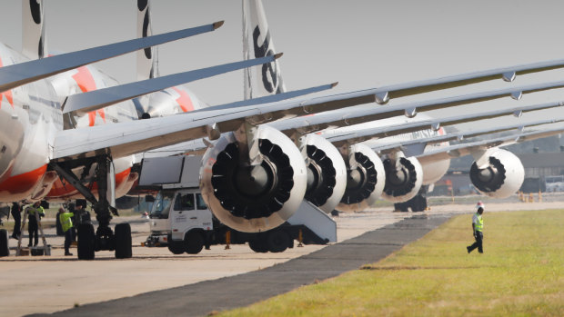 Jetstar planes being parked for storage at Avalon Airport, near Geelong, on Friday. 