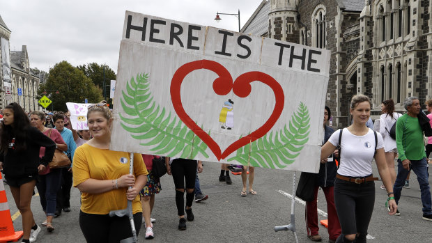 New Zealanders at a March for Love following the attacks. 