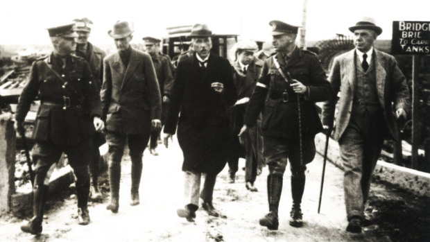 General John Monash conducts prime minister Billy Hughes and Lord Burham through newly occupied territory on the Western Front.