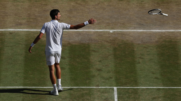 Throwing down: The moment Novac Djokovic secured yet another title at Wimbledon.