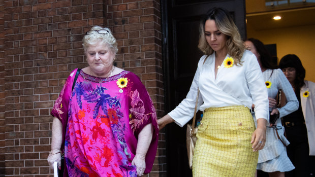 Joanne Dunn (left) leaves court after reading a victim impact statement.