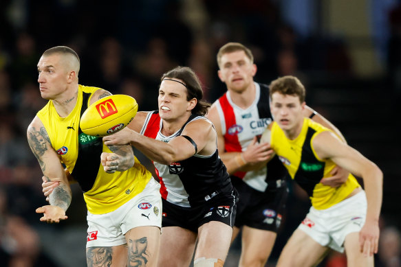 Dustin Martin is tackled by Hunter Clark.