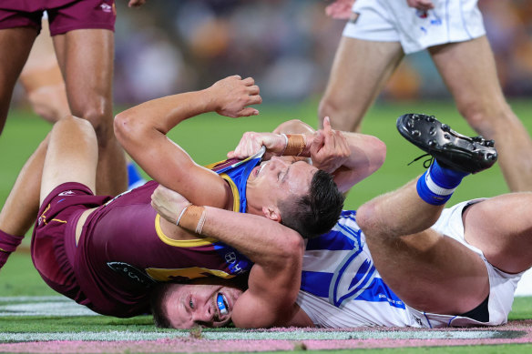 Down day: The Roos were crushed by the Lions.