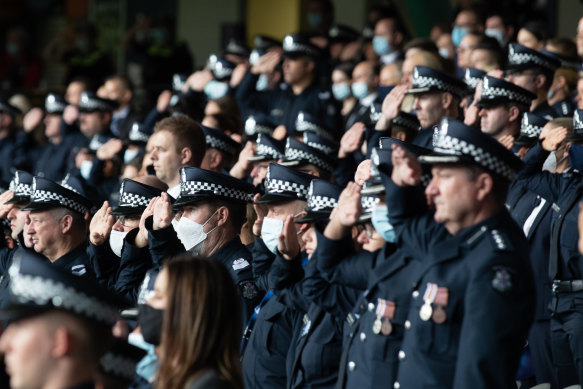 Members of Victoria Police honour four colleagues who lost their lives in the Eastern Freeway tragedy in 2020 at a state memorial service at Marvel Stadium on Thursday.