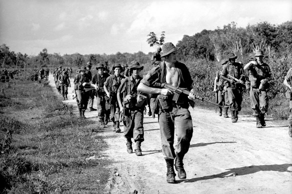 Australian troops make their way back to Bien Hoa Airbase after a joint operation with US forces.