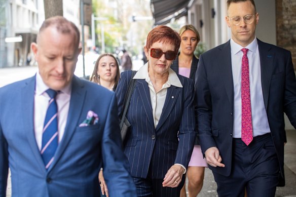 Connolly arrives for her first day as a witness.