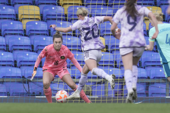 Mackenzie Arnold keeps a keen eye on the movements of Scotland’s Martha Thomas during April’s friendly loss in London.