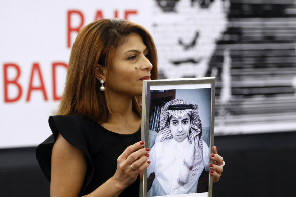 Ensaf Haidar, the wife of jailed Saudi Arabian blogger Raif Badawi, pictured in 2015 with portrait of her husband.