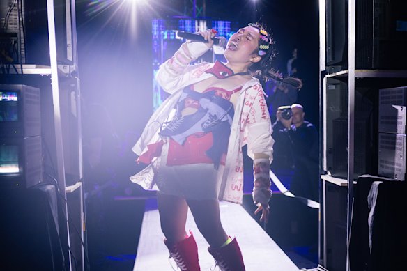 Rapper MUNGMUNG performs at the Wings Independent Fashion Festival.