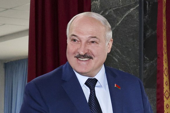 Belarusian President Alexander Lukashenko votes in the referendum on constitutional amendments.