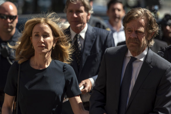 Felicity Huffman and her husband William H. Macy arrive at court for the sentencing.