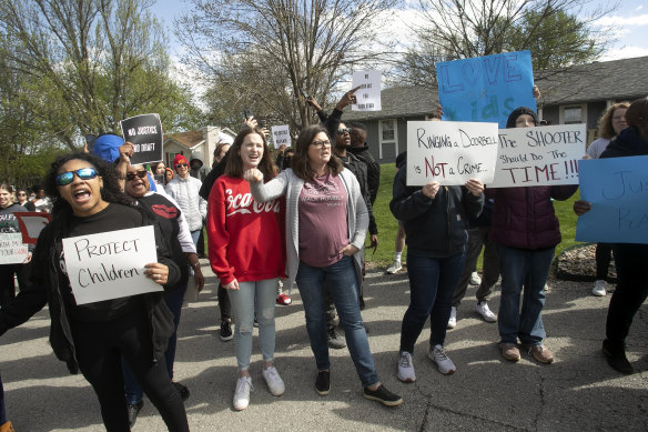 Protesters march in Kansas City, Missouri, on Sunday to draw attention to the shooting.