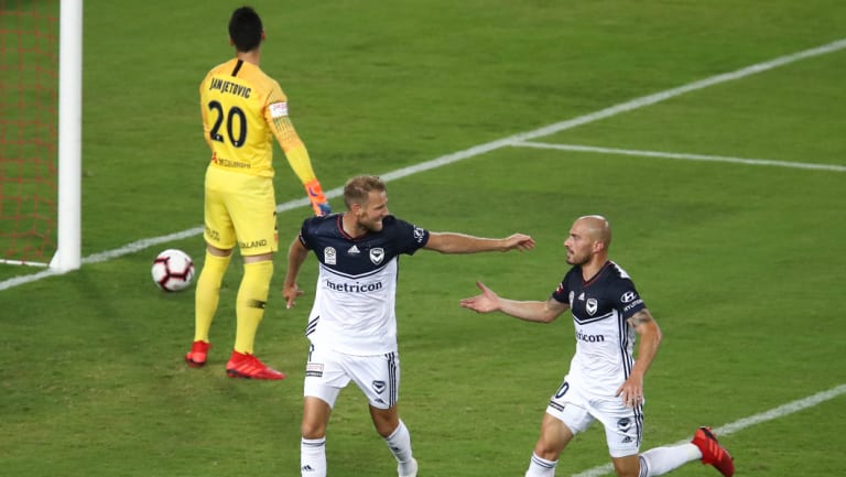 The clincher: Ola Toivonen, left, celebrates his goal with James Troisi.