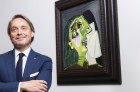 Tony Ellwood AM, Director of the NGV with The Weeping Woman by Picasso.