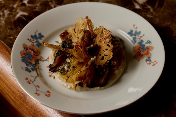Charred yellow beetroot with sunflower tahini, candied lemon, dehydrated pineapple and lemon thyme.