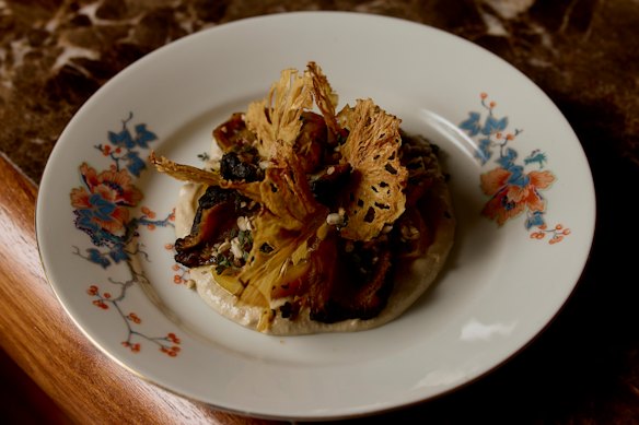 Charred yellow beetroot with sunflower tahini, candied lemon, dehydrated pineapple and lemon thyme.