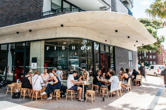 The outdoor tables at Fish Shop are particularly busy on weekends.