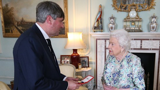 British poet laureate Simon Armitage meets the boss, the late Queen Elizabeth II, on his appointment in 2019.