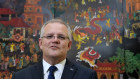 Australian Prime Minister Scott Morrison speaks to the media in Vietnam en route to the G7.