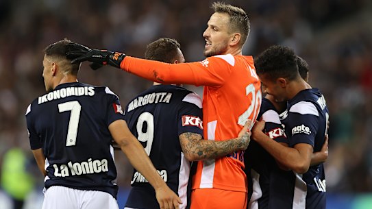MELBOURNE, AUSTRALIA - FEBRUARY 05: The Victory celebrates after the they defeated the Mariners during the 2021 FFA Cup Final match between Melbourne Victory and Central Coast Mariners at AAMI Park on February 05, 2022 in Melbourne, Australia. (Photo by Robert Cianflone/Getty Images)
