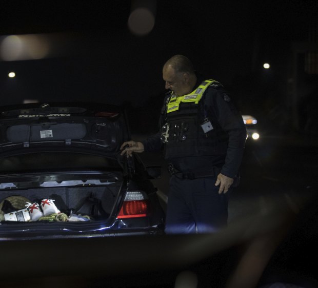 Acting Superintendent Andy McKee pulls over a motorist in the early hours of August 6 as part of Victoria Police’s Operation Trinity, targeting aggravated burglaries and associated car thefts.