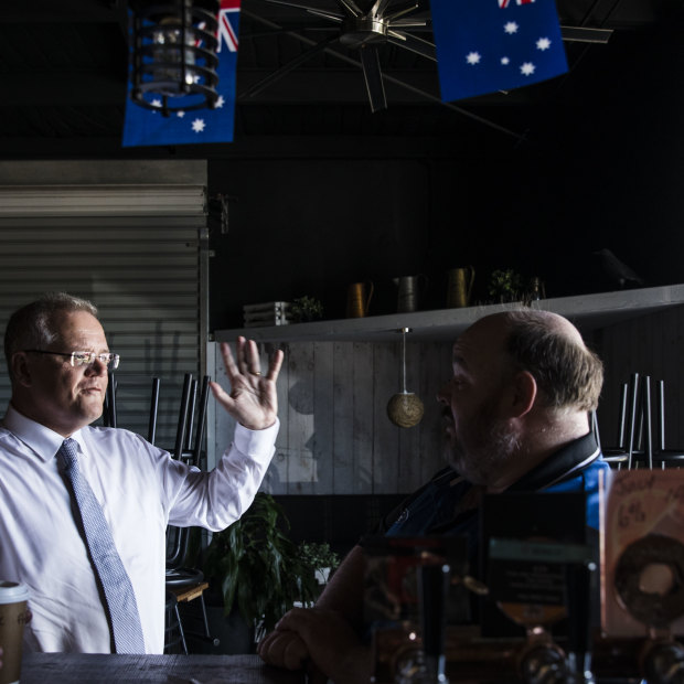 The Prime Minister speaks to Paul Metcalfe, the co-owner of the Crow n Arrow hotel in the Brisbane suburb of Lawnton.