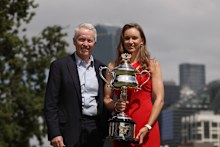 Elena Rybakina and Craig Tiley pose after the women’s singles final.