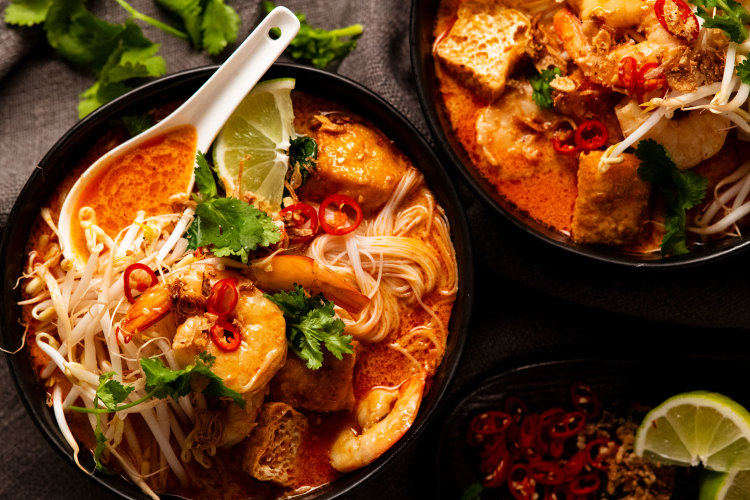 Speedy prawn and noodle laksa with tofu puffs.