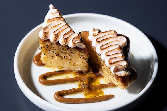 Tres leches cake topped with torched Aperol meringue.