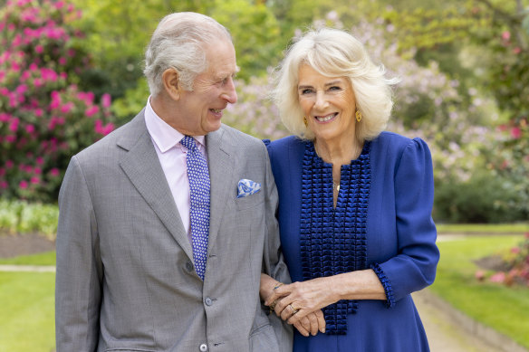 Britain’s King Charles III and Queen Camilla stand in Buckingham Palace Gardens on Wednesday April 10, 2024, the day after their 19th wedding anniversary. This photo is being released on Friday, April 26, 2024, to mark the first anniversary of their Coronation. Buckingham Palace says King Charles III will resume his public duties next week following treatment for cancer. The announcement on Friday April 26, 2024, comes almost three months after Charles took a break from public appearances to focus on his treatment for an undisclosed type of cancer. 