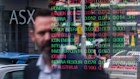 The ASX board in Sydney. The market operator has been unable to publish company announcements all morning.