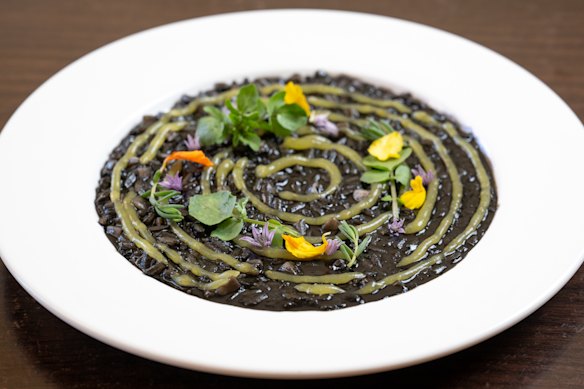 Risotto nero with saffron and Lakes Entrance squid.