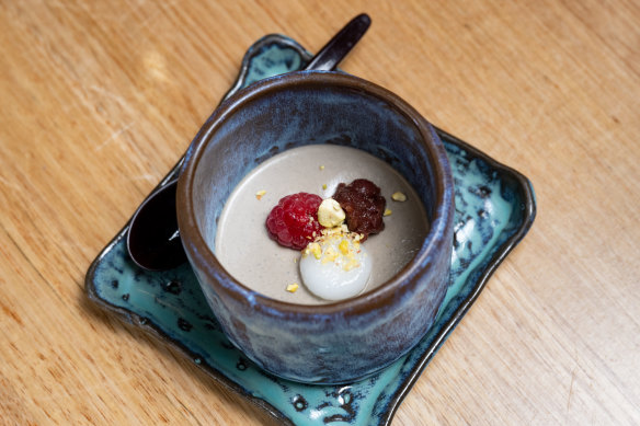 Hojicha pudding served in handmade ceramics.