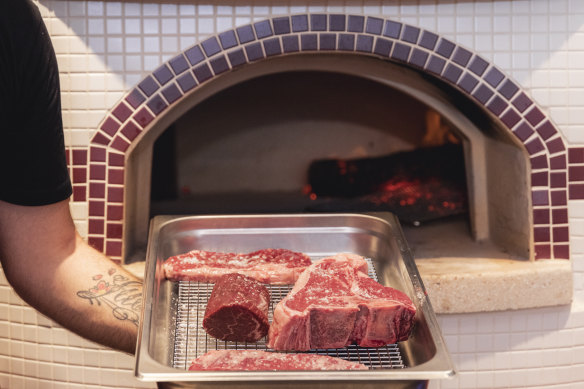 Steak, including a one-kilo bistecca, are cooked in the wood oven.