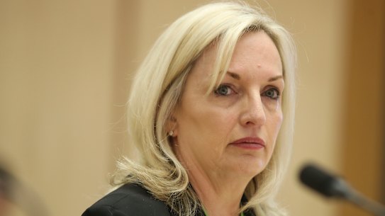 Australia Post boss Christine Holgate has urged post offices not to go on strike over her sidelining as chief executive.