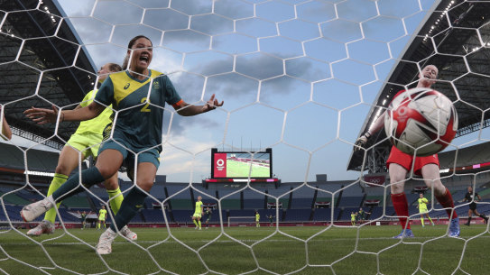 Kerr celebrates scoring against USA at the Tokyo Olympics. 