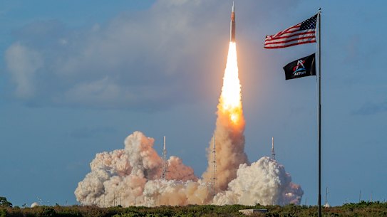 NASA's Artemis II lunar rocket lifts off from Kennedy Space Center.