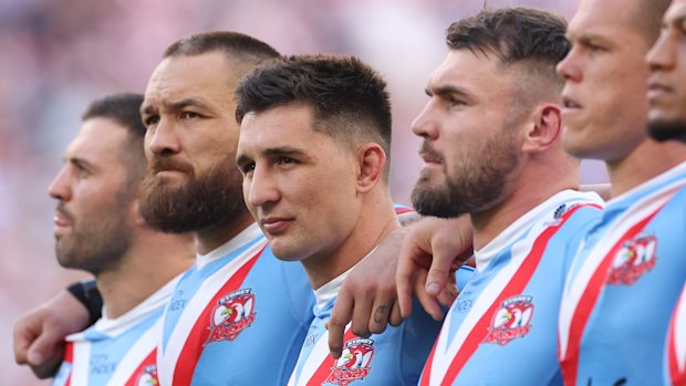 Victor Radley, centre, during the Last Post before the 2023 Anzac Day clash.
