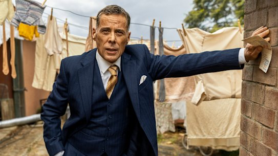 Marcus Graham plays slippery slumlord Benny Bates in the drama series Ten Pound Poms.  