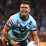 Latrell Mitchel celebrates after scoring a try during Origin game two last year.