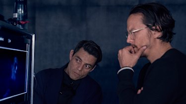 Rami Malek (left) and Cary Joji Fukunaga on the set of No Time To Die. 