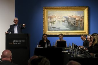 Business has never been better for Australia’s art auctioneers. This picture, taken in April, show’s Arthur Streeton’s The Grand Canal being auctioned off by Deutscher and Hackett in Melbourne.