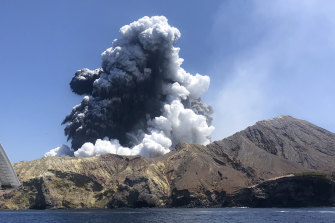 The eruption at White Island as seen from a tourist boat.