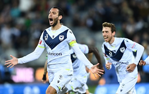 Miranda celebrates scoring a goal during the A-League match on Saturday night.