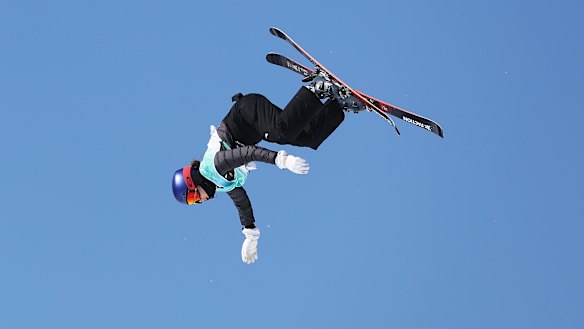 Eileen Gu in mid-air.