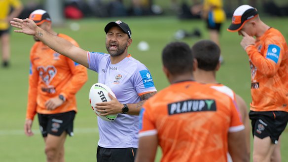 Benji Marshall barks orders at Wests Tigers training on Thursday.