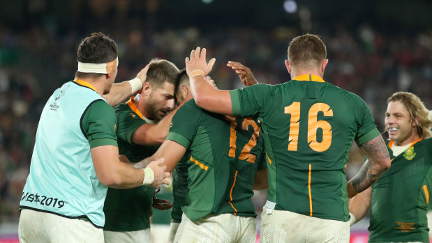 South Africa celebrate their 19-16 win over Wales in the World Cup semi-final. 