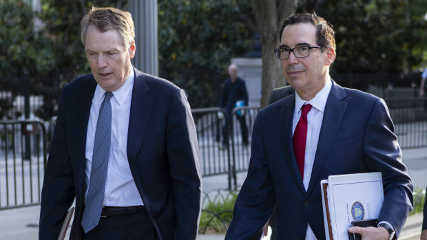 US Trade Representative Robert Lighthizer, left, and Treasury Secretary Steven Mnuchin walk back to the White House after the talks.